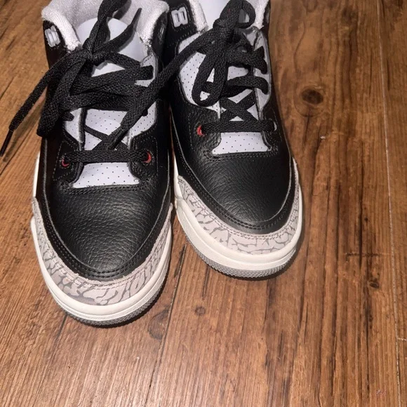Jordan Kids Black and White Sneakers with Red Accents